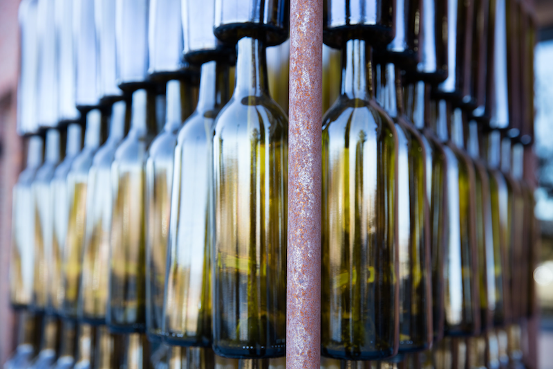 Empty green wine bottles credit Wine Country Media