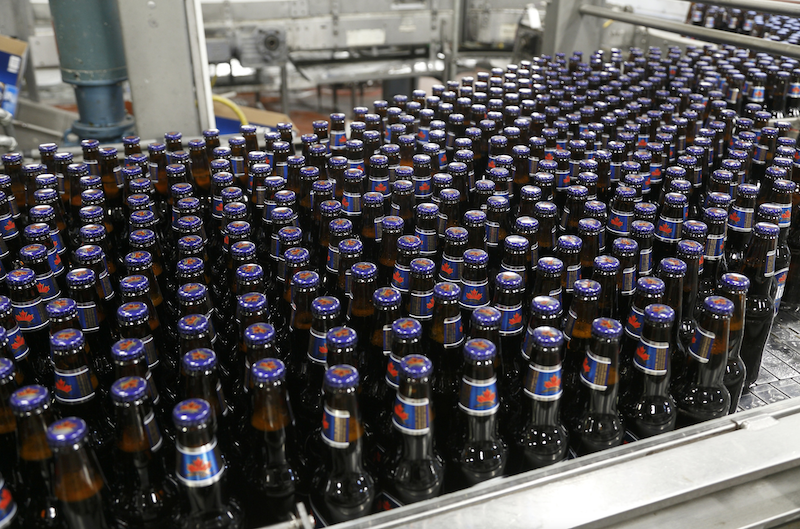 Freshly brewed bottles of Labatt Blue credit CNW Group Labatt Breweries of Canada