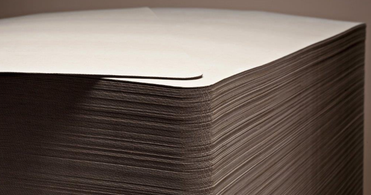 Non-slip sheets from paper or corrugated cardboard