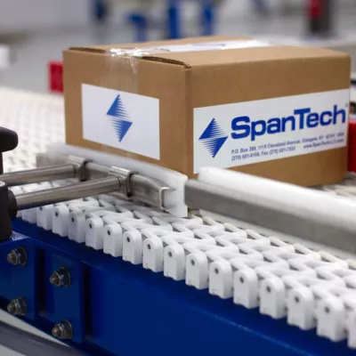 Span Tech conveyor stops and pushes