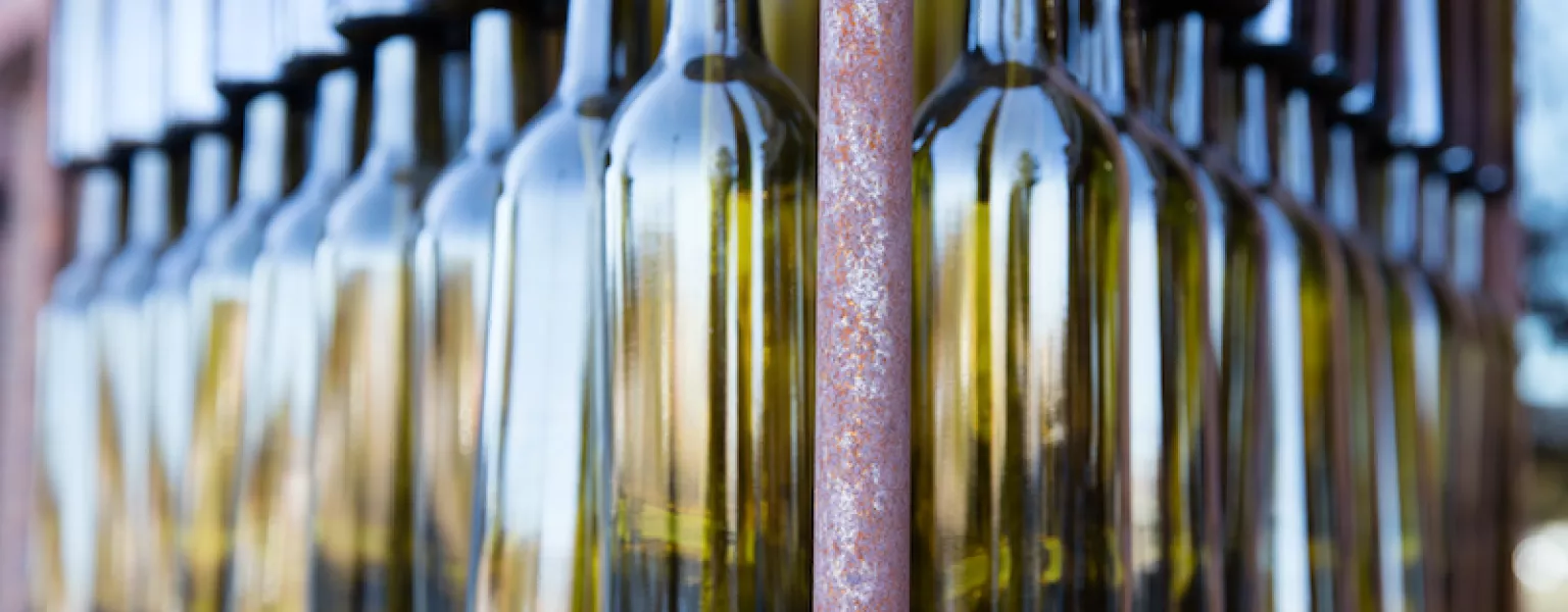 Empty green wine bottles credit Wine Country Media