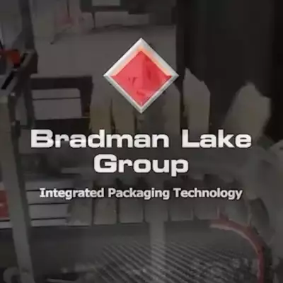 Bradman Lake WR Wraparound Case Packer - Case packing cheese blocks